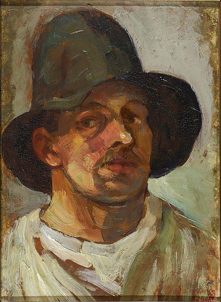 437px-Theo_van_Doesburg_Selfportrait_with_hat